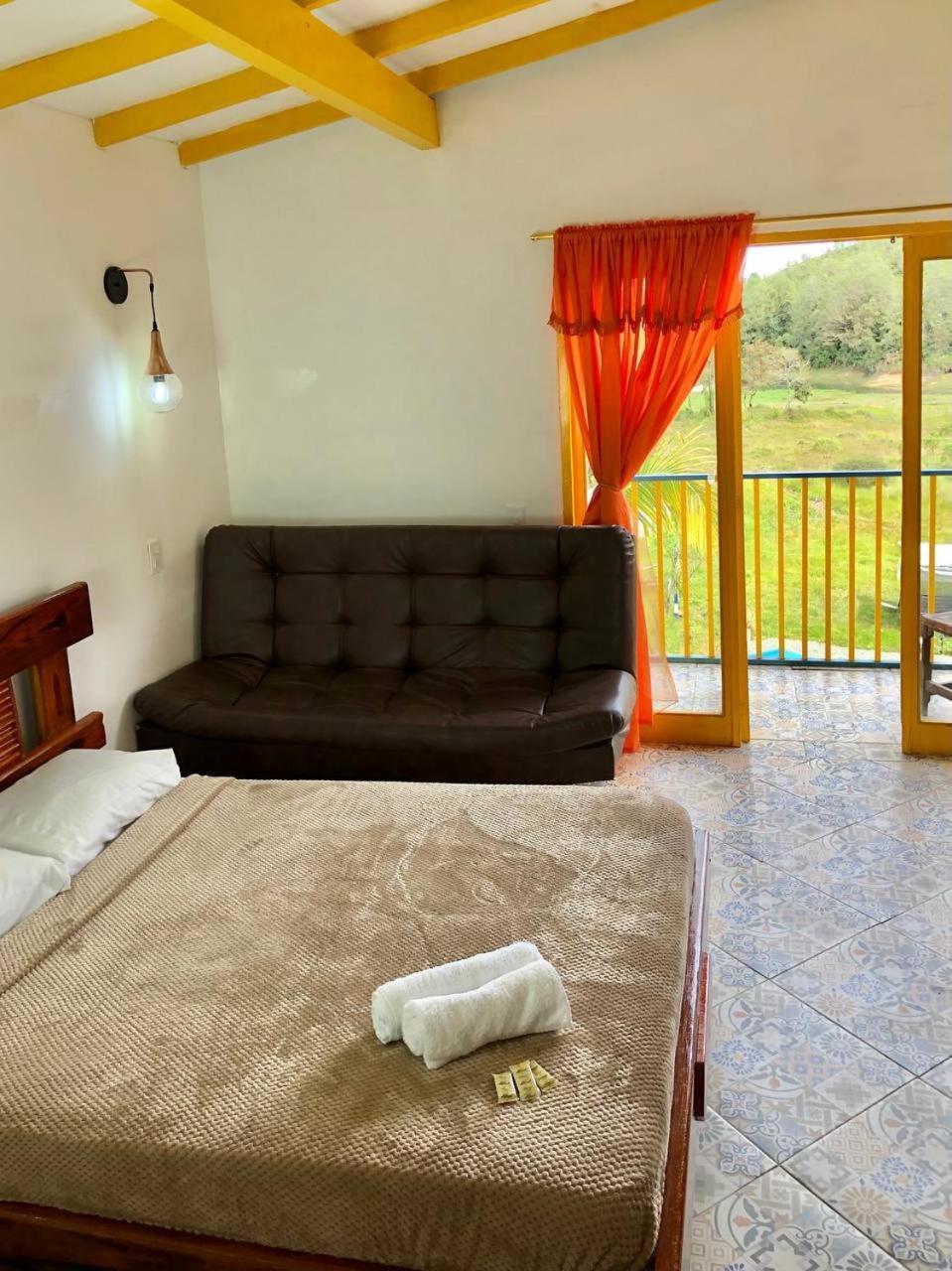 Alegria Hostel Boutique Guatape Ruang foto